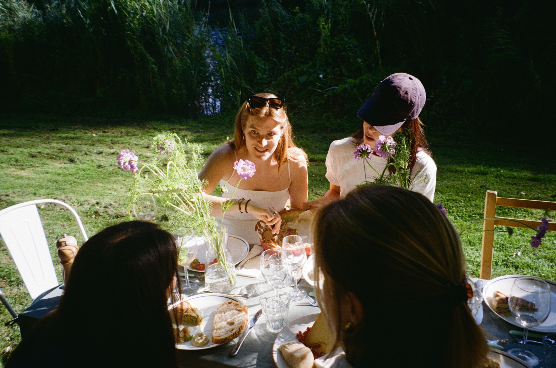 Friends sharing a meal outdoors